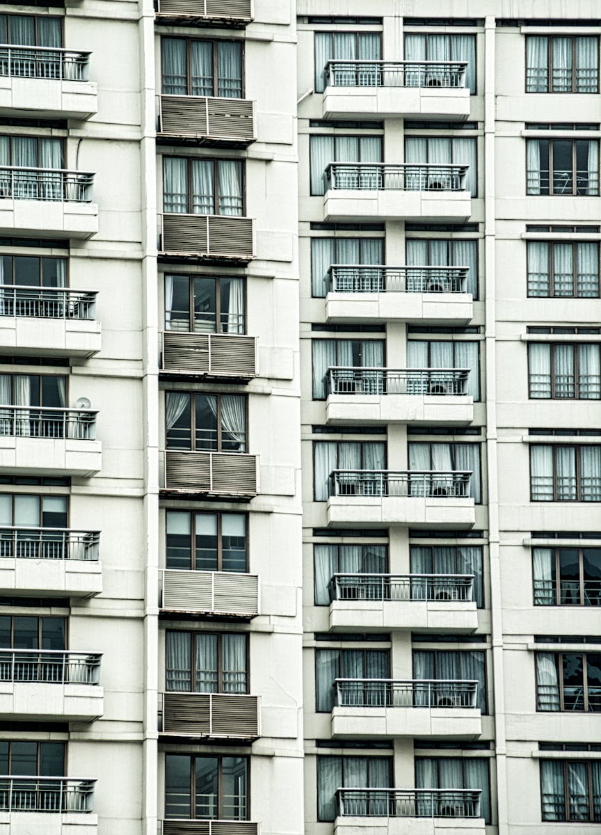 condo Detailed view of a modern condominium building with balconies in Jakarta, Indonesia.